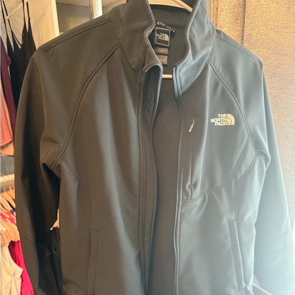 The North Fave weather jacket. Size M